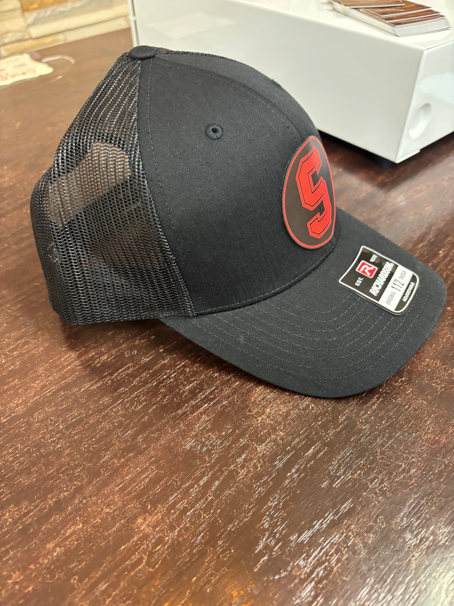 Seymour All Black Colored Patch Trucker Hat