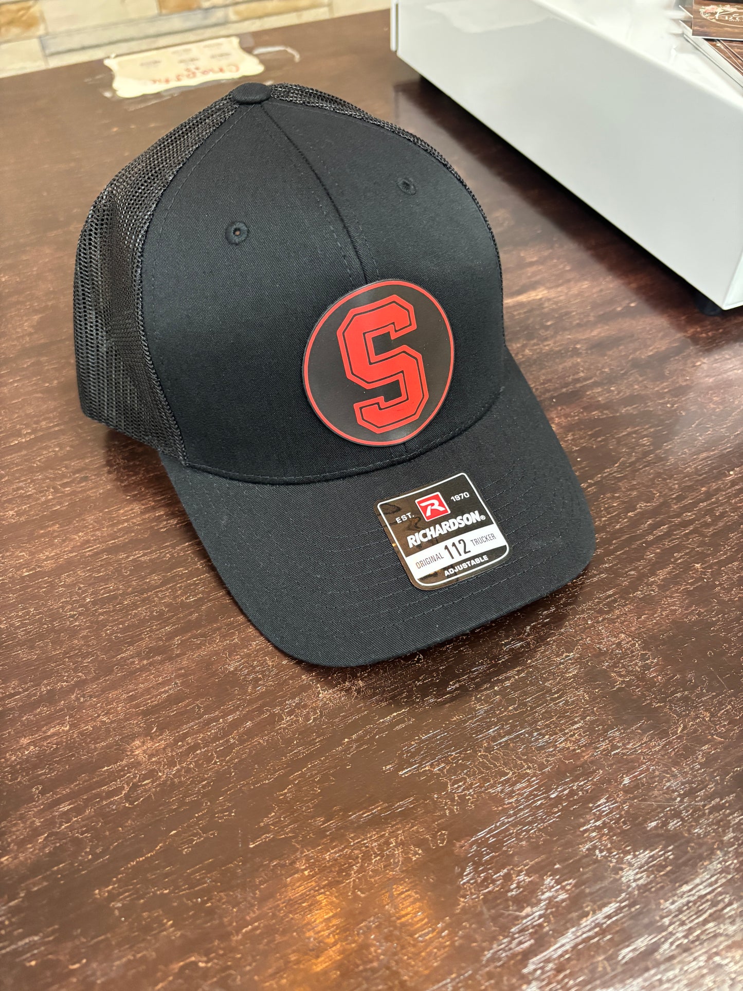 Seymour All Black Colored Patch Trucker Hat