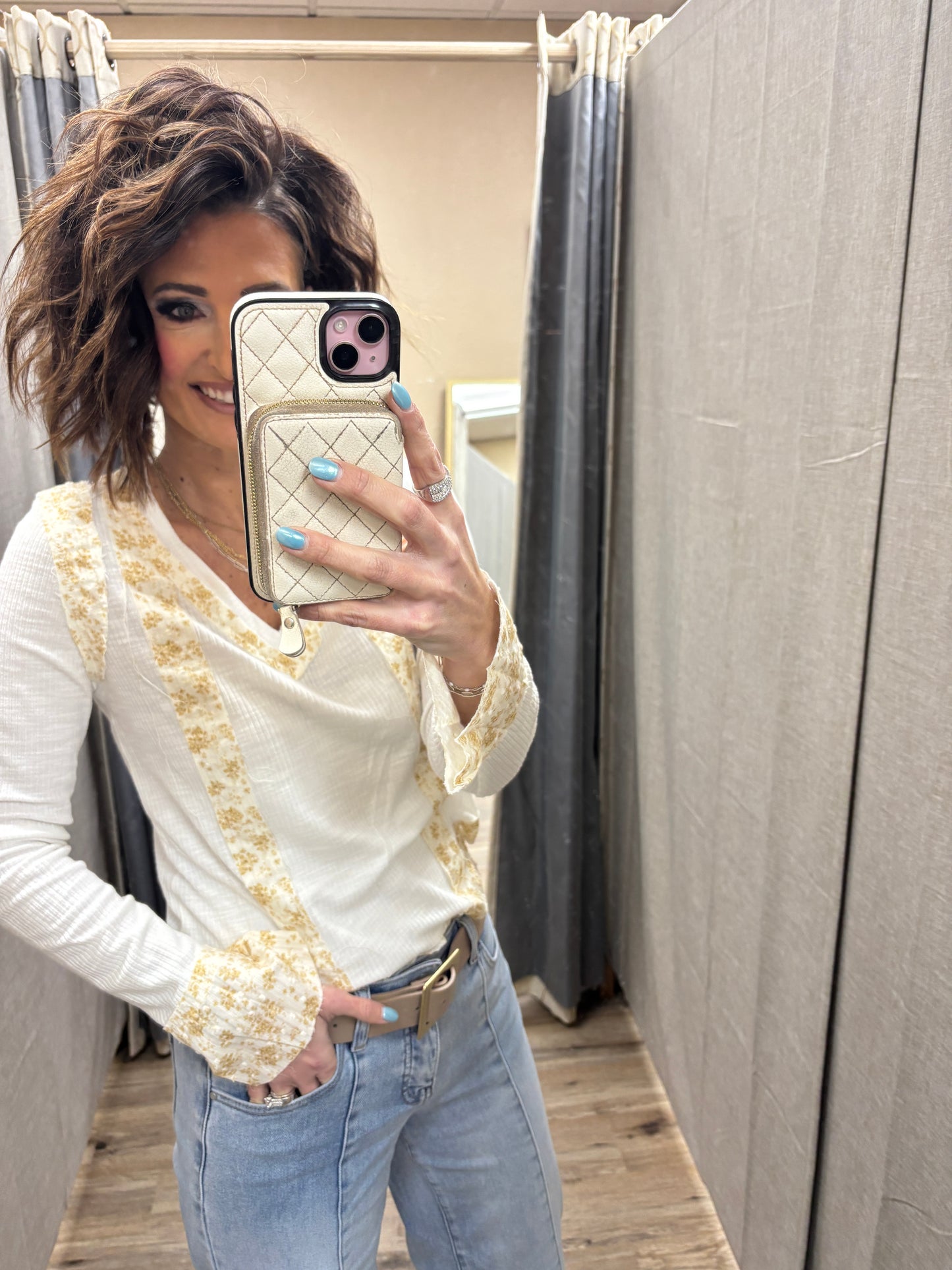 Off White V Neck with Floral Accent