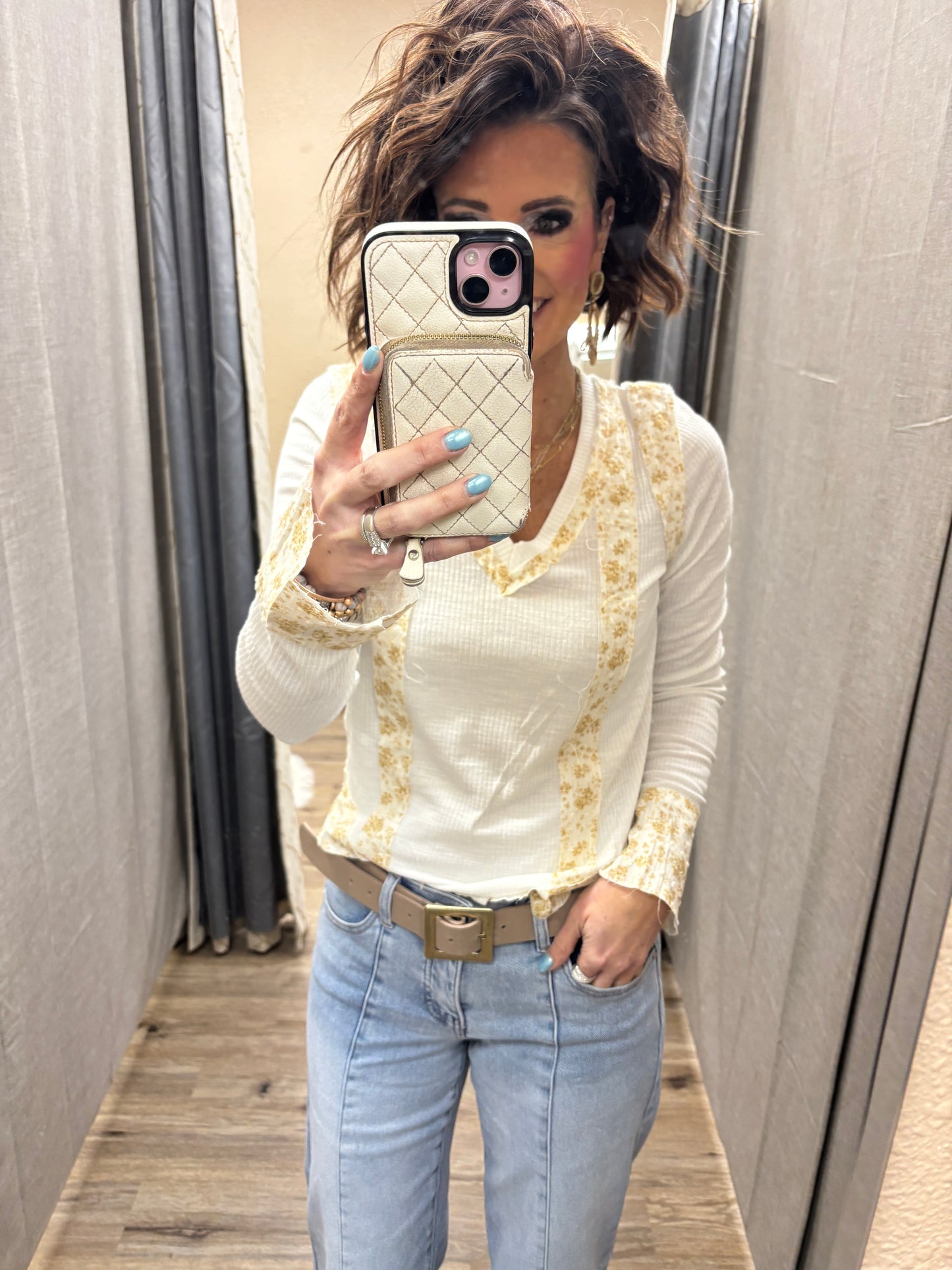 Off White V Neck with Floral Accent